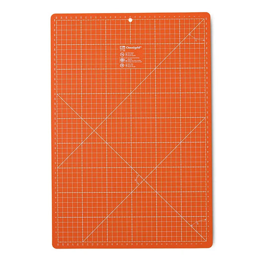 Base de corte Prym, con divisiones en cm/pulgadas, 30x45cm, naranja